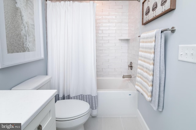 full bathroom featuring vanity, tile patterned flooring, toilet, and shower / bath combo