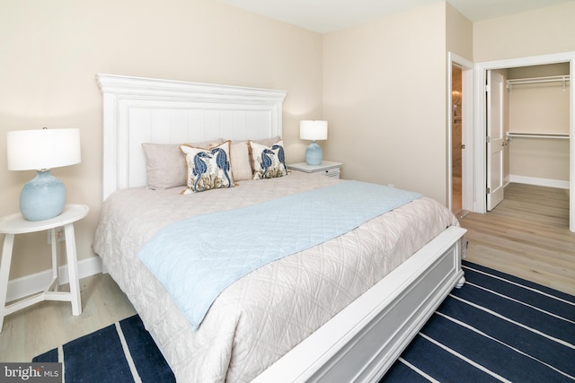 bedroom featuring wood-type flooring