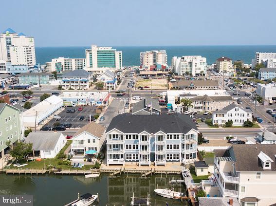 drone / aerial view with a water view