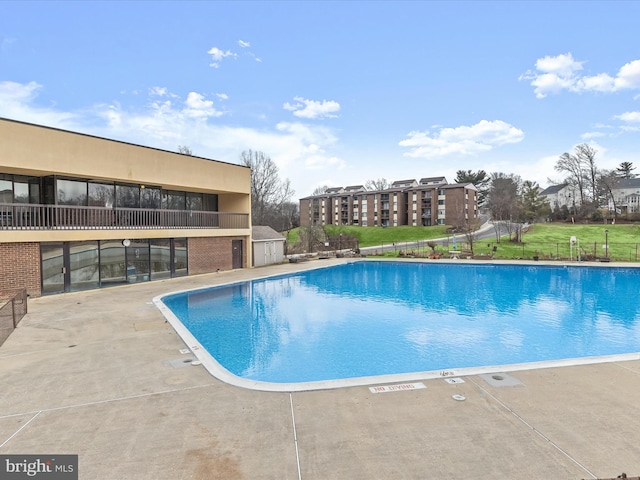 view of pool with a patio area