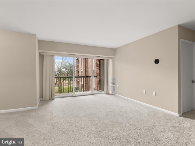 view of carpeted spare room