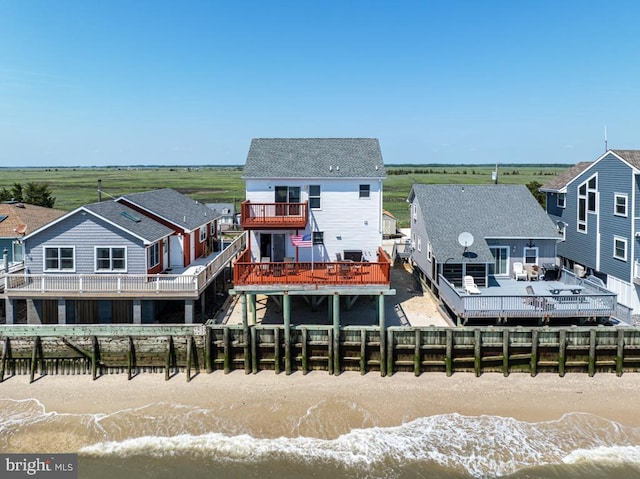 rear view of house with a deck