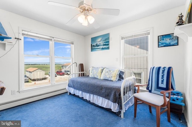 bedroom featuring a baseboard heating unit, ceiling fan, and carpet flooring