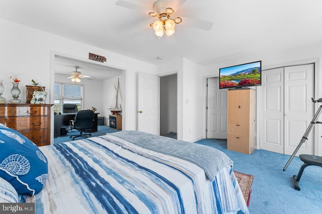 carpeted bedroom featuring ceiling fan and a closet