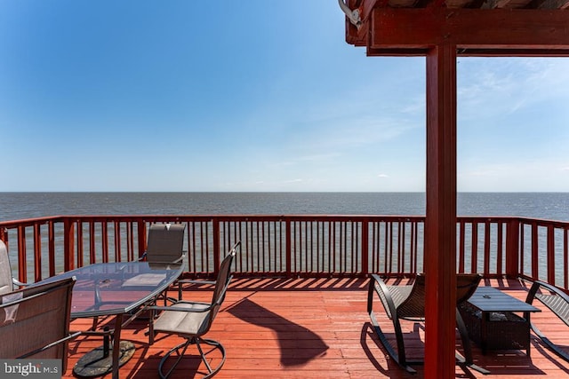 deck featuring a water view