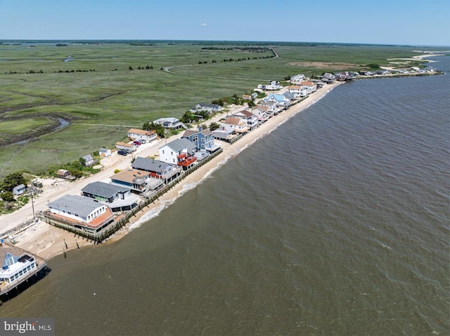 bird's eye view with a water view and a rural view