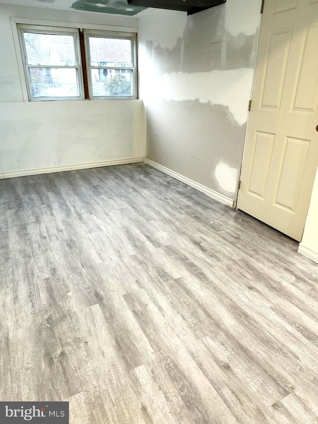 basement with light wood-type flooring