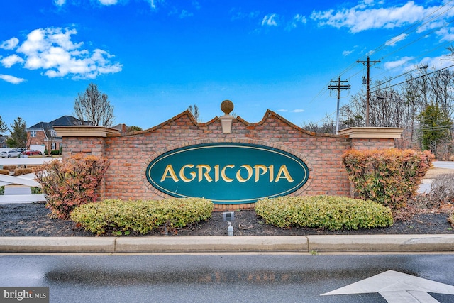 view of community sign