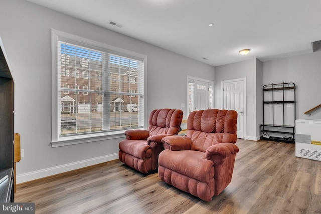 living area featuring hardwood / wood-style flooring