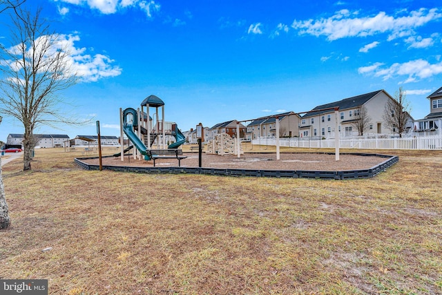 view of playground featuring a lawn