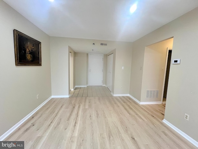 empty room with light wood-type flooring