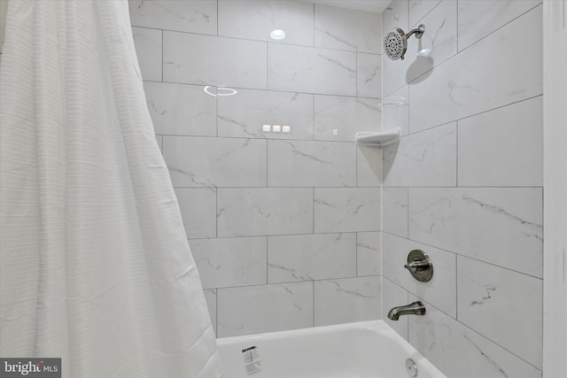 bathroom with shower / bath combo