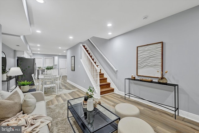 living room with light hardwood / wood-style floors