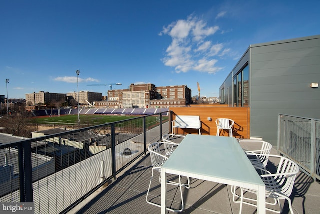 balcony featuring a view of city