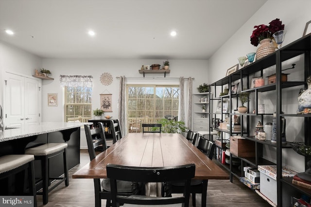 dining room with recessed lighting and dark wood-style flooring