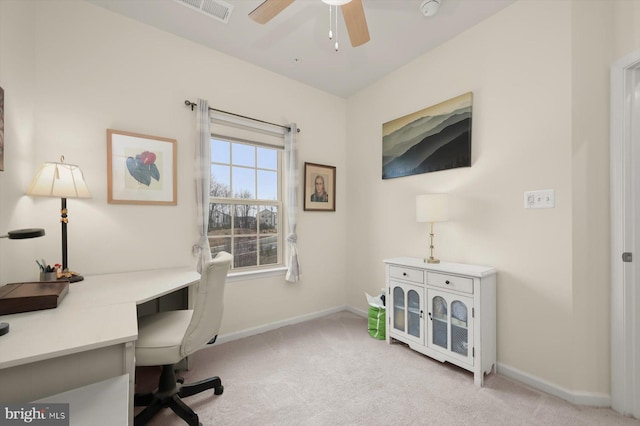 office with light carpet, visible vents, and baseboards