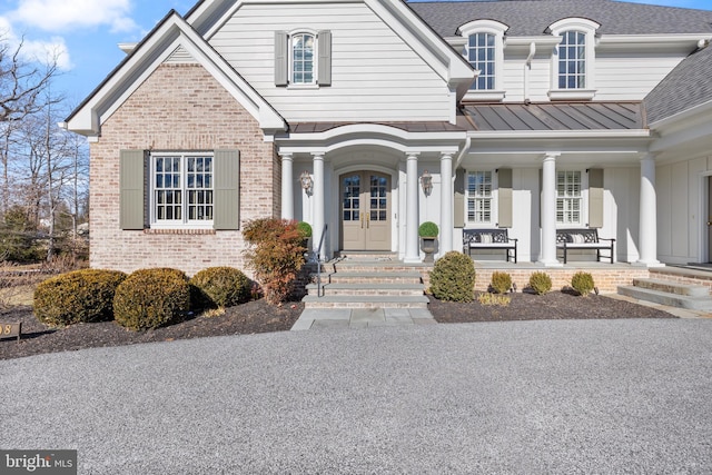 view of front of property featuring covered porch