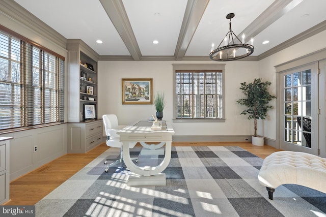 office area with beamed ceiling, crown molding, a notable chandelier, and light hardwood / wood-style flooring