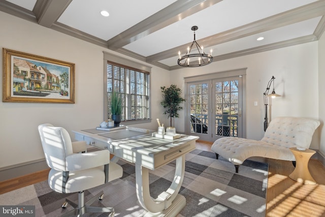 interior space featuring beamed ceiling, plenty of natural light, hardwood / wood-style flooring, and an inviting chandelier