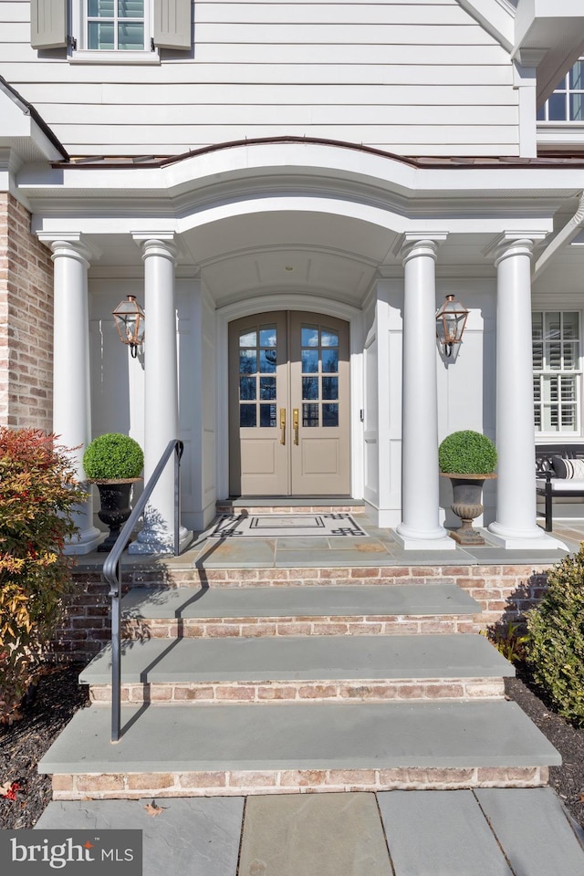 entrance to property featuring french doors