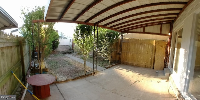 view of patio / terrace featuring a carport