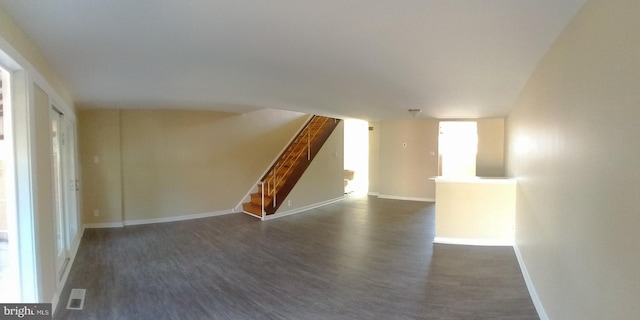 spare room featuring dark hardwood / wood-style floors