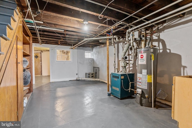 basement featuring gas water heater