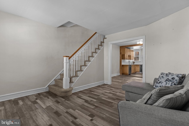 unfurnished living room featuring dark hardwood / wood-style floors