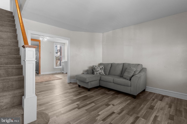 living room with dark hardwood / wood-style floors