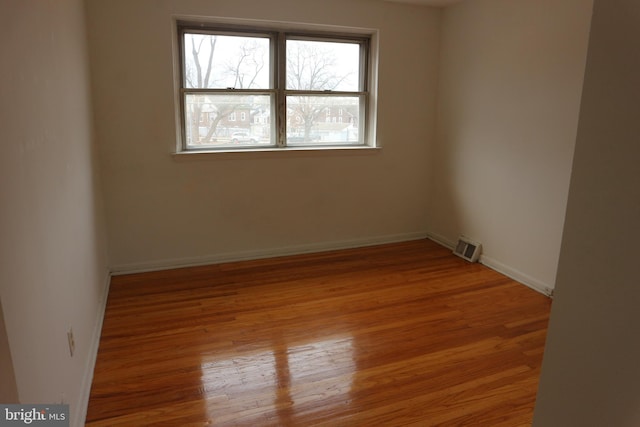 empty room featuring light hardwood / wood-style floors