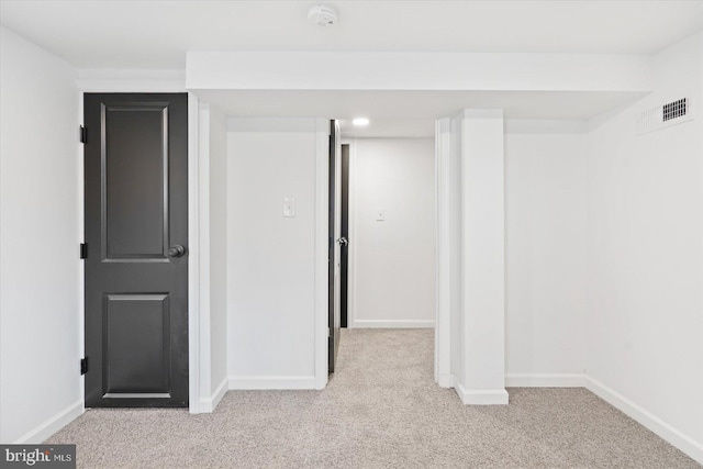 interior space with light colored carpet