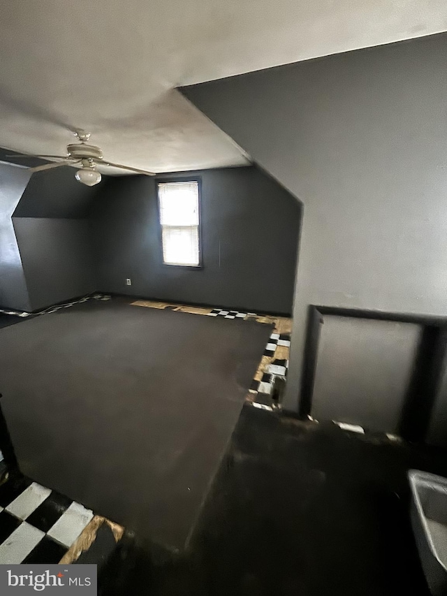 bonus room featuring vaulted ceiling and ceiling fan