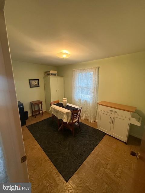 dining space with light wood-style floors