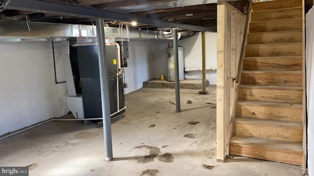 basement with heating unit and water heater