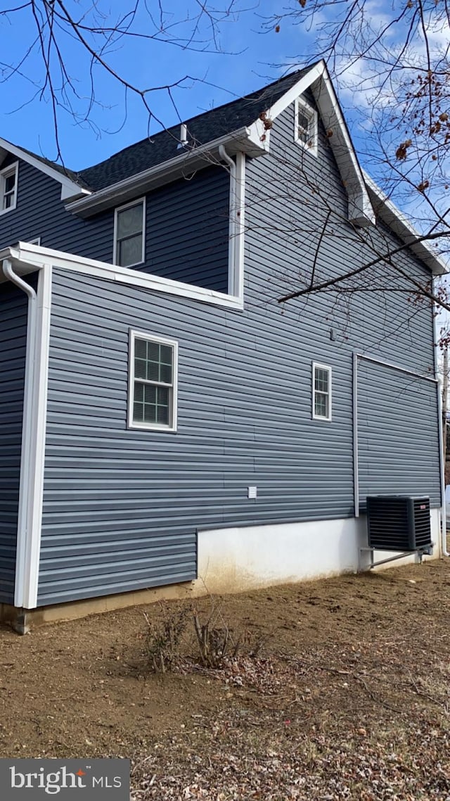 view of property exterior with cooling unit