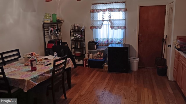 dining space featuring hardwood / wood-style flooring