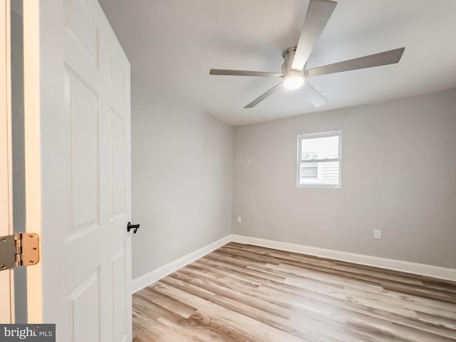 unfurnished room featuring ceiling fan and light hardwood / wood-style flooring