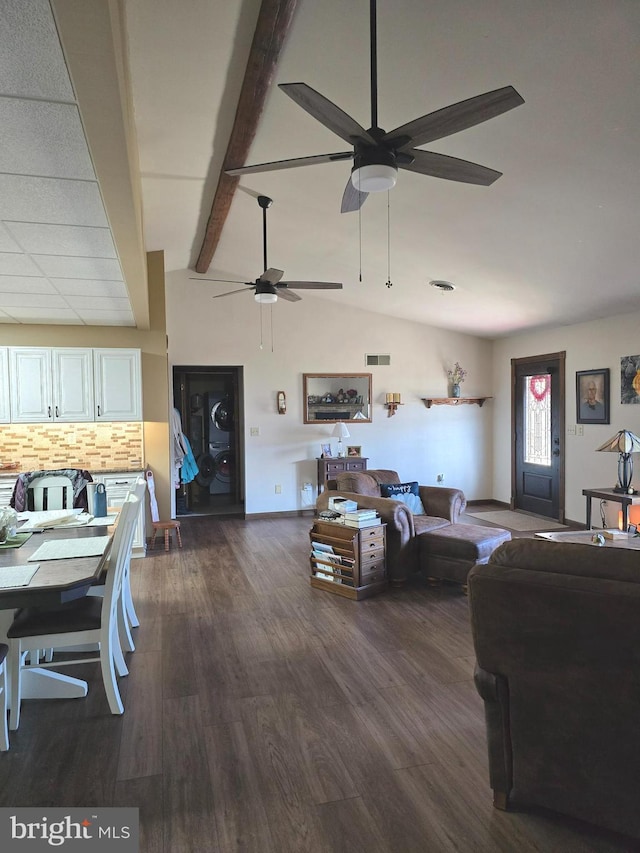 living room with dark wood-type flooring, ceiling fan, and lofted ceiling with beams