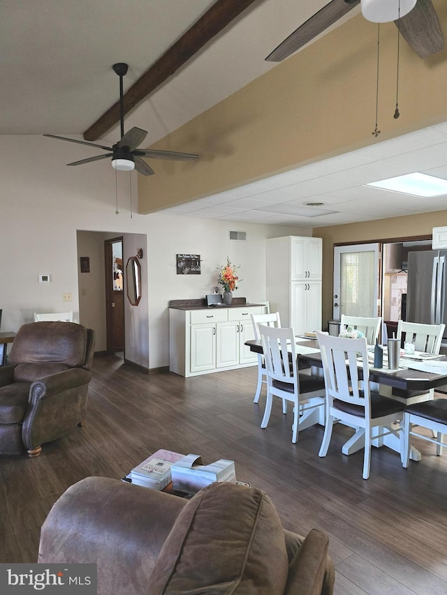 living room featuring beam ceiling, dark wood-type flooring, high vaulted ceiling, and ceiling fan