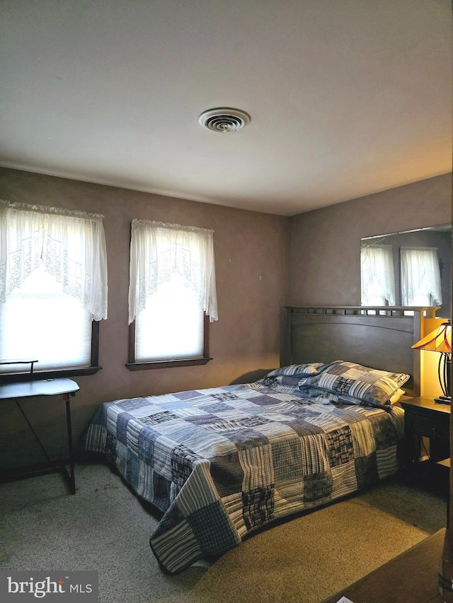 bedroom featuring carpet floors