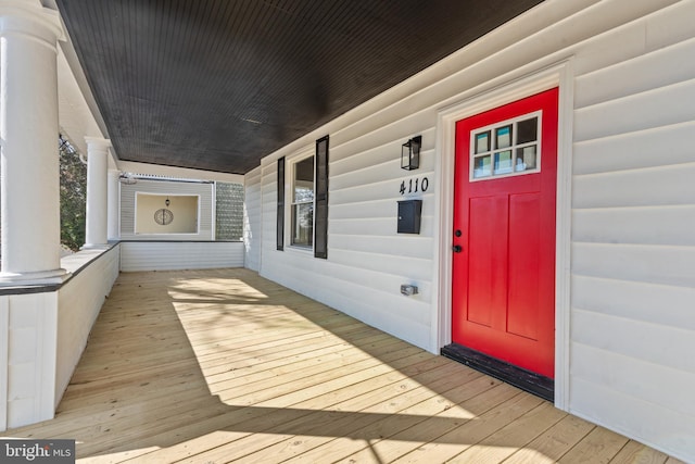 property entrance with a porch