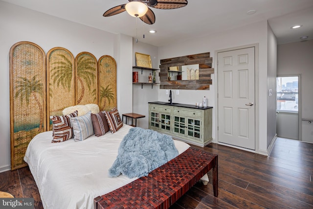 bedroom with dark wood-style floors, ceiling fan, baseboards, and recessed lighting