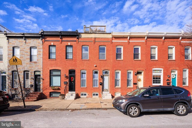 view of front of property with brick siding