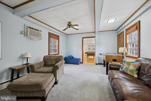 carpeted living room featuring a wall mounted air conditioner, crown molding, and ceiling fan