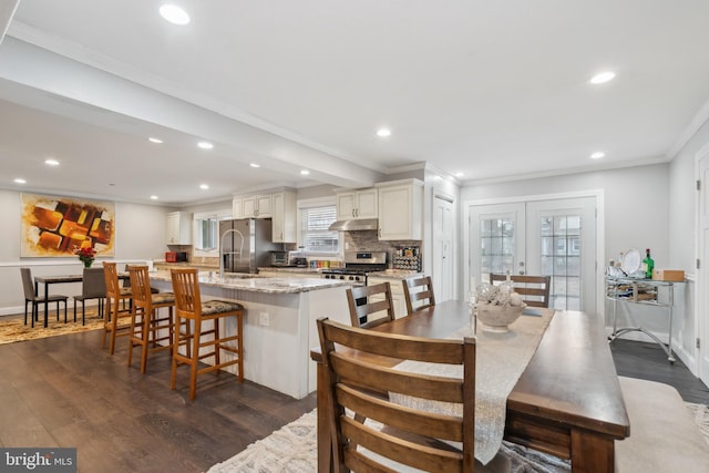 dining room featuring recessed lighting, baseboards, french doors, dark wood-style floors, and crown molding