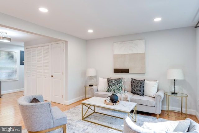 12452 White Horse Rd, Lusby, MD 20657 - living room with light wood-style flooring, recessed lighting, and baseboards