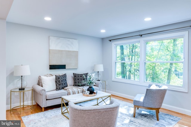 12452 White Horse Rd, Lusby, MD 20657 - living room with recessed lighting, light wood-style floors, and baseboards