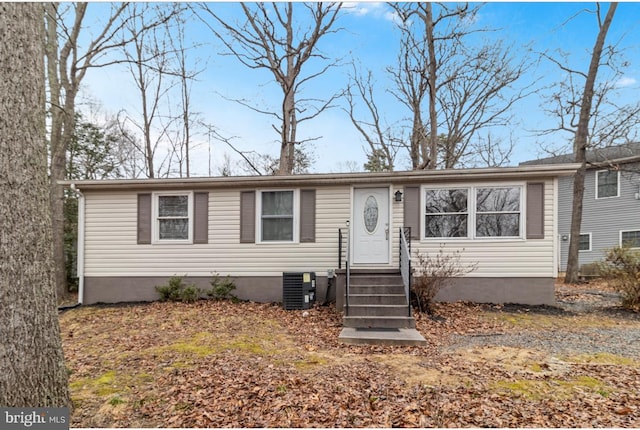 12452 White Horse Rd, Lusby, MD 20657 - ranch-style home featuring entry steps and cooling unit