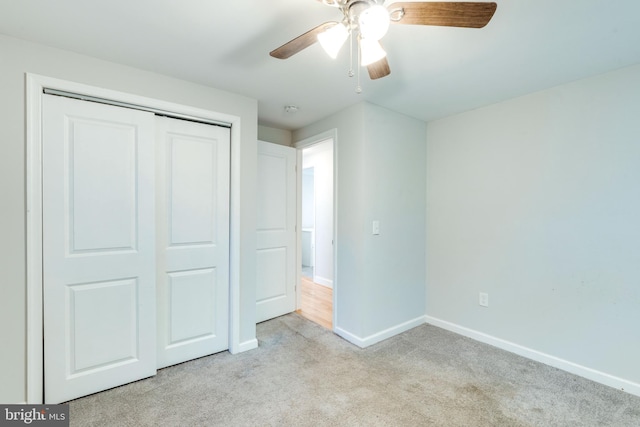 12452 White Horse Rd, Lusby, MD 20657 - unfurnished bedroom with a closet, carpet floors, baseboards, and ceiling fan