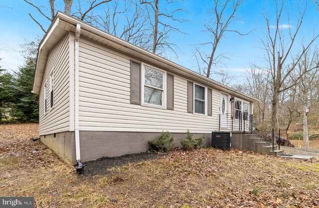 12452 White Horse Rd, Lusby, MD 20657 - view of property exterior with central AC